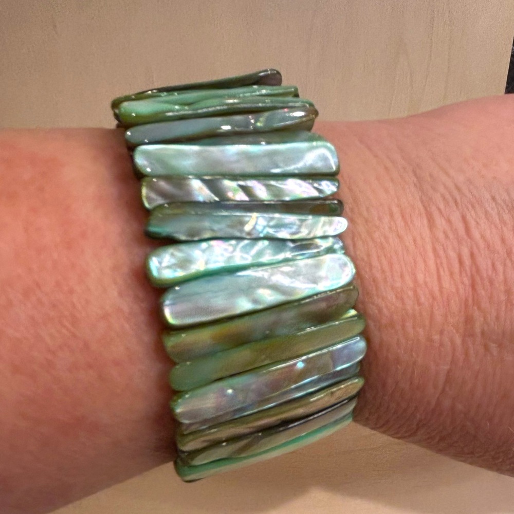 Mother of Pearl Abalone Shell light green shades panel stretch bracelet.